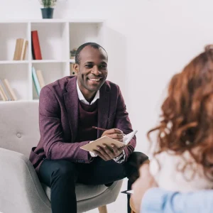 smiling-african-american-psychiatrist-talking-to-y-2022-12-16-16-17-17-utc-1920×1281-1.webp smiling-african-american-psychiatrist-talking-to-y-2022-12-16-16-17-17-utc-1920x1281-1.webp